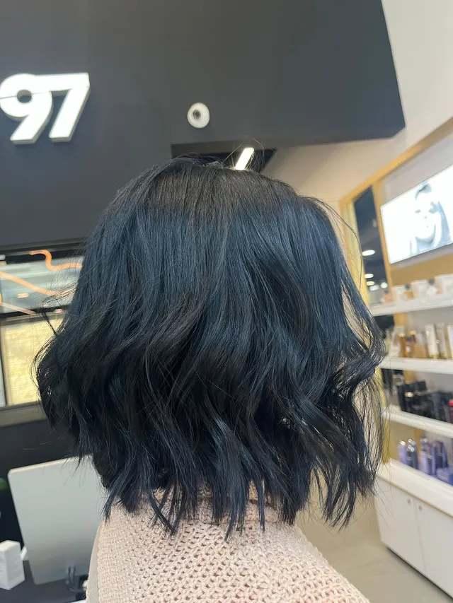 Glossy blue-black tousled bob, cut and finished at Room 97