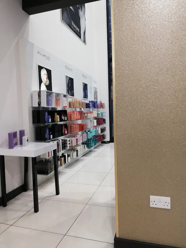 The Kérastase and Shu Uemura retail wall at Room 97